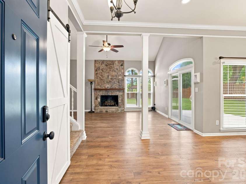 7134 Forest Hills Drive, Denver, NC 28037.  MLS# CAR4413877, YatesRealty ID 45040. Entry looking into greatroom