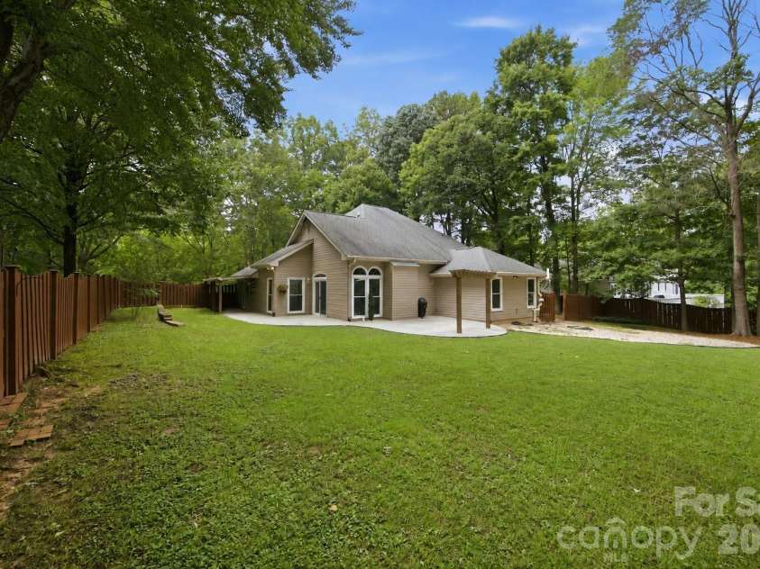 7134 Forest Hills Drive, Denver, NC 28037.  MLS# CAR4413877, YatesRealty ID 45040. Huge backyard