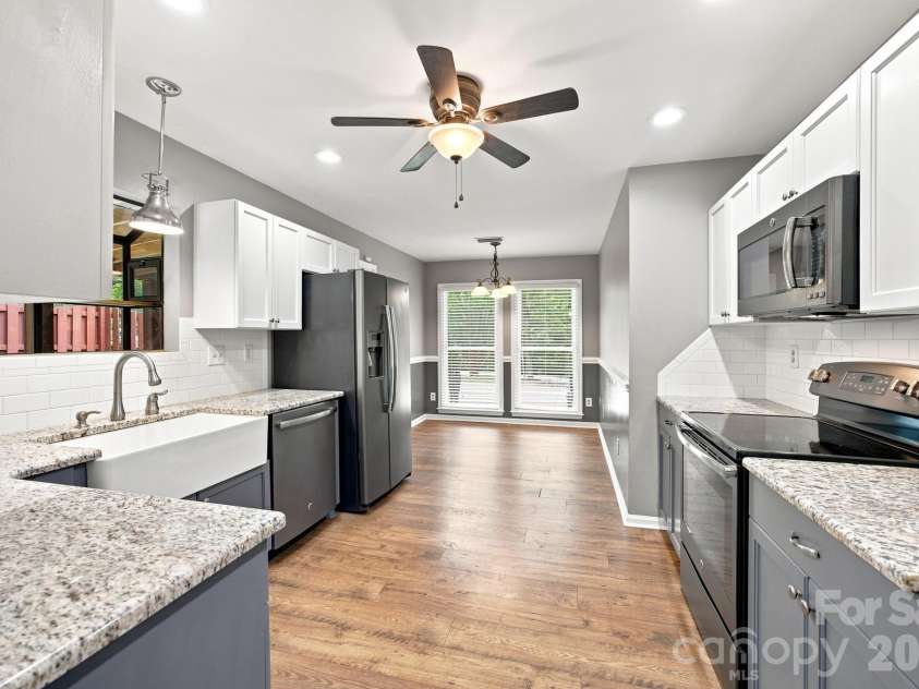7134 Forest Hills Drive, Denver, NC 28037.  MLS# CAR4413877, YatesRealty ID 45040. Kitchen looking into breakfast nook