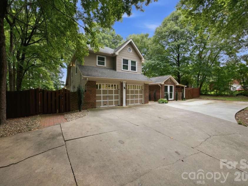 7134 Forest Hills Drive, Denver, NC 28037.  MLS# CAR4413877, YatesRealty ID 45040. Left side entry to side yard