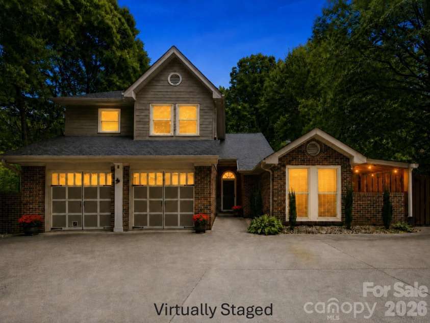 7134 Forest Hills Drive, Denver, NC 28037.  MLS# CAR4413877, YatesRealty ID 45040. Twilight front exterior
