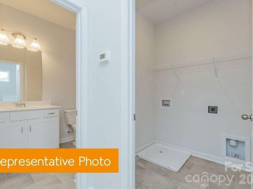 5710 Ringneck Road, Charlotte, NC 28216.  MLS# CAR4414001, YatesRealty ID 45064. Hall bath/ Laundry