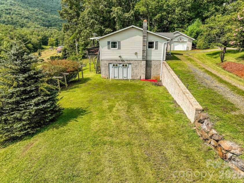 427 Big Brush Creek Road, Green Mountain, NC 28740.  MLS# CAR4415308, YatesRealty ID 45069. 
