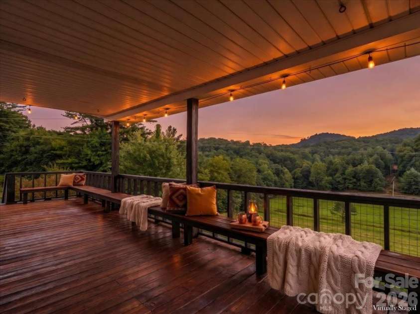 427 Big Brush Creek Road, Green Mountain, NC 28740.  MLS# CAR4415308, YatesRealty ID 45069. Virtually staged covered back deck