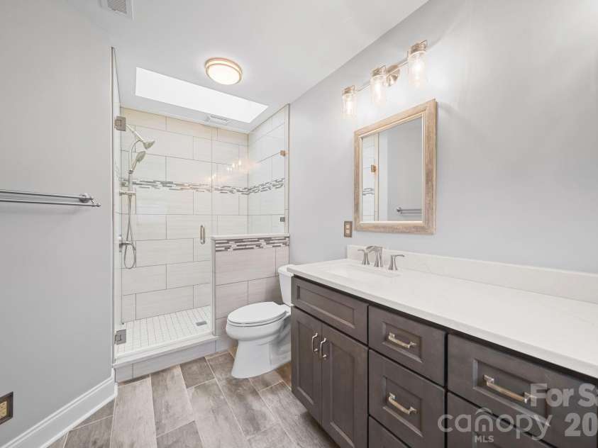 2527 Heathershire Lane, Matthews, NC 28105.  MLS# CAR4410552, YatesRealty ID 45077. 