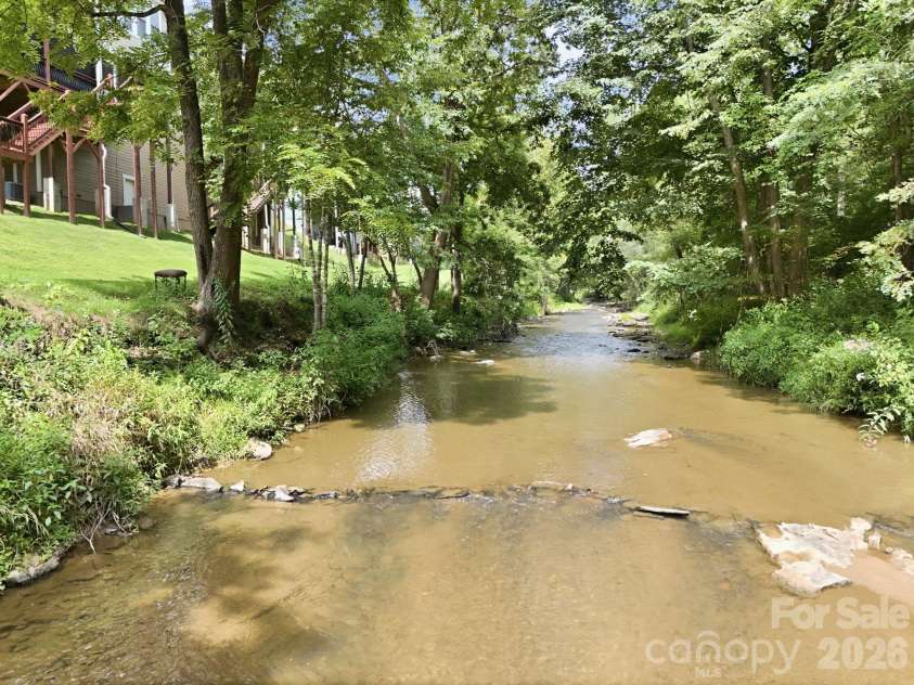 45 Creekside View Drive, Asheville, NC 28804.  MLS# CAR4411206, YatesRealty ID 45086. Creek view