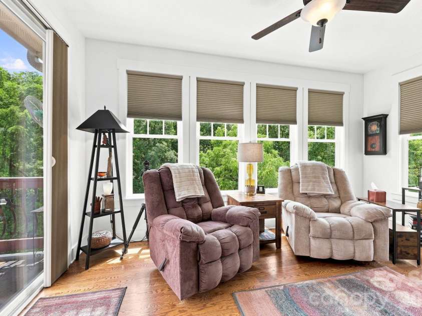 45 Creekside View Drive, Asheville, NC 28804.  MLS# CAR4411206, YatesRealty ID 45086. The den has direct access to the upper deck.