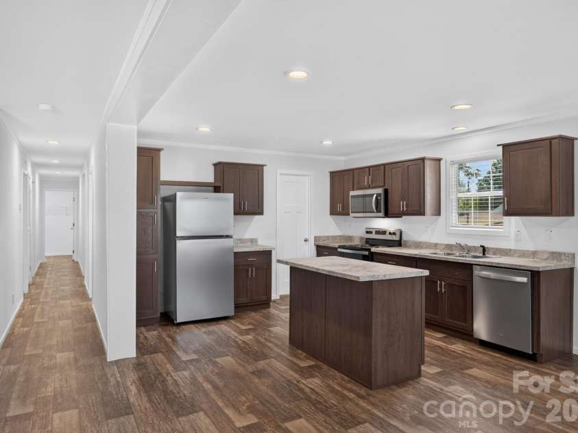 1303 Elrado Street, Burlington, NC 27217.  MLS# CAR4413497, YatesRealty ID 45094. Hall - Kithcen