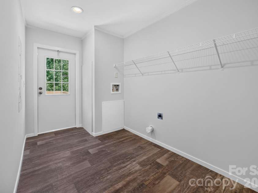 1303 Elrado Street, Burlington, NC 27217.  MLS# CAR4413497, YatesRealty ID 45094. Utility/Laundry - out to side deck