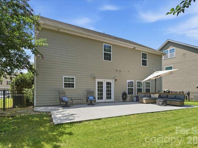 3829 Franklin Meadows Drive, Matthews, NC 28105.  MLS# CAR4412409, YatesRealty ID 45095. Expansive Rear Patio