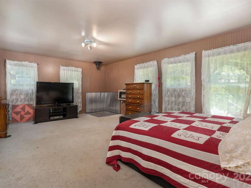 1145 Woolyshot Branch Road, Hot Springs, NC 28743.  MLS# CAR4295648, YatesRealty ID 451. Additional family room. Upper level. 