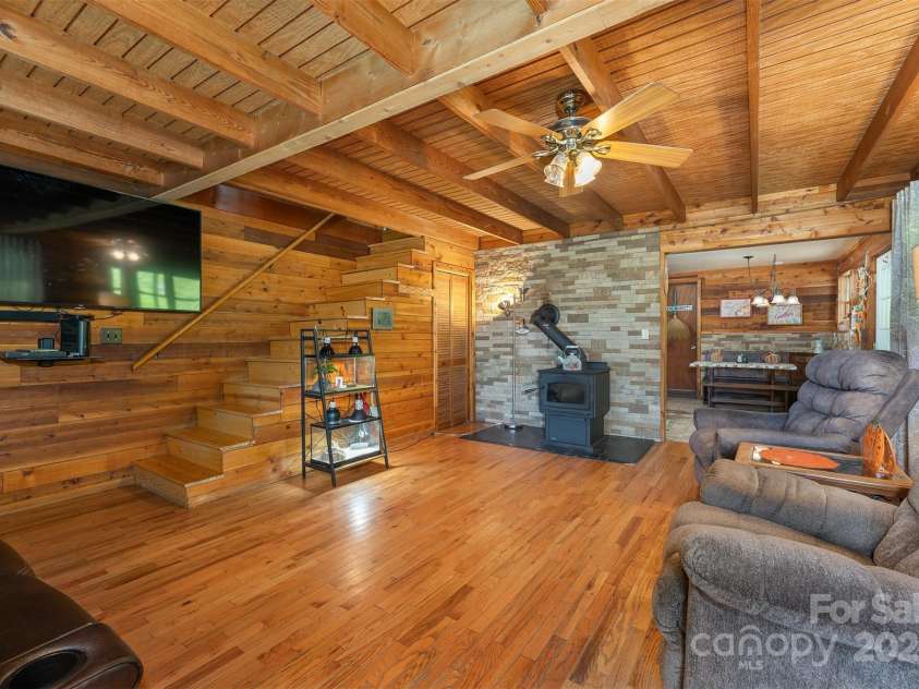 1145 Woolyshot Branch Road, Hot Springs, NC 28743.  MLS# CAR4295648, YatesRealty ID 451. Living room. 