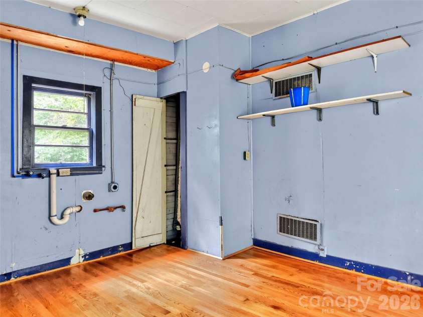 22 Woodbend Lane, Black Mountain, NC 28711.  MLS# CAR4415693, YatesRealty ID 45101. Laundry room