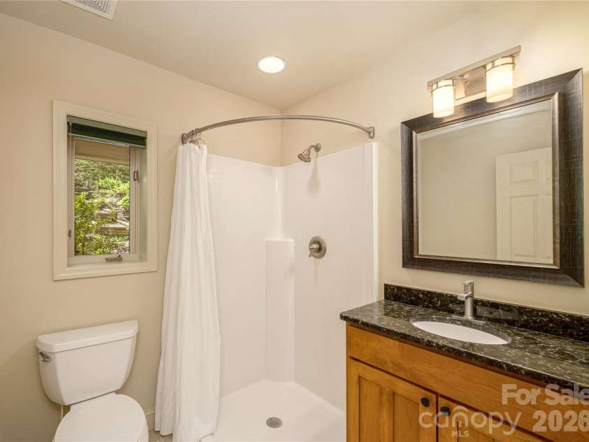 281 Bob White Loop, Waynesville, NC 28786.  MLS# CAR4414207, YatesRealty ID 45126. Downstairs Bath