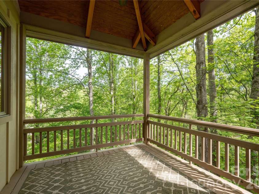 281 Bob White Loop, Waynesville, NC 28786.  MLS# CAR4414207, YatesRealty ID 45126. Upstairs Deck off of Dining Area