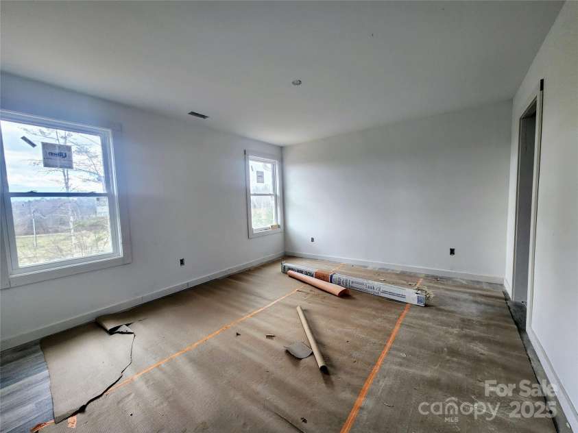 59 Eller Ford Road, Weaverville, NC 28787.  MLS# CAR4229304, YatesRealty ID 4513. Primary Bedroom