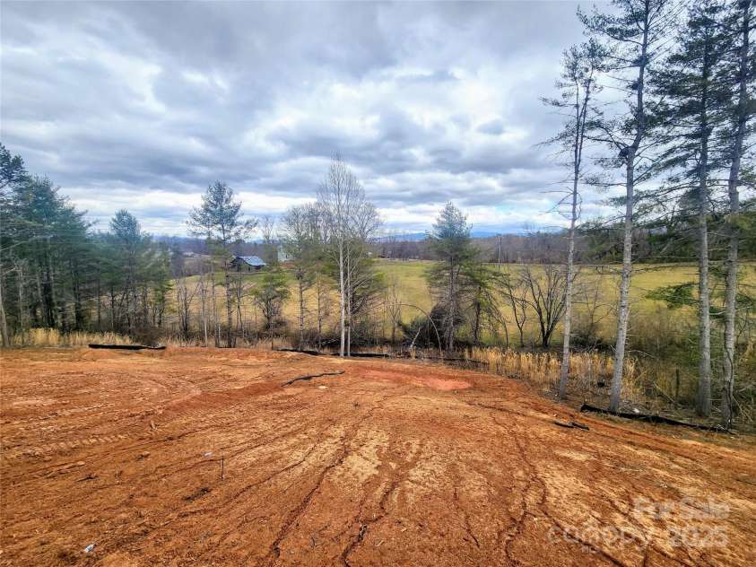 59 Eller Ford Road, Weaverville, NC 28787.  MLS# CAR4229304, YatesRealty ID 4513. Views from the back porch.