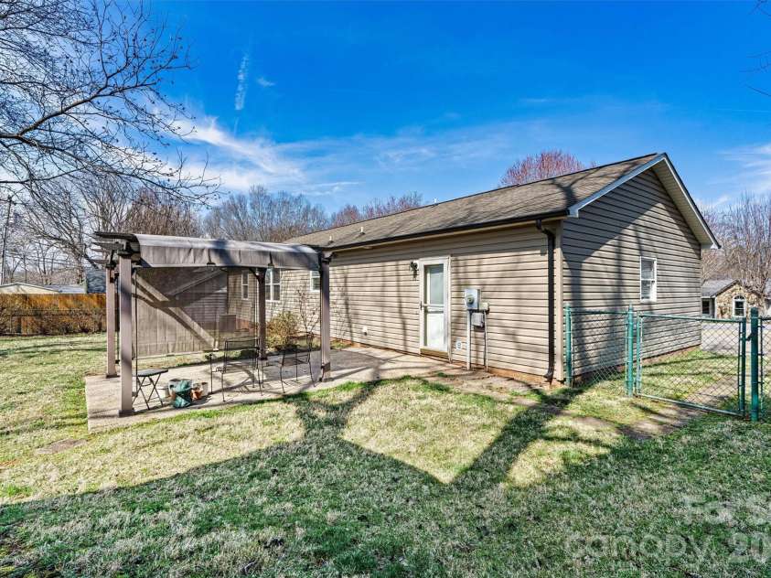 215 Towne Court, Conover, NC 28613.  MLS# CAR4354978, YatesRealty ID 4514. Back Patio Focused View 
