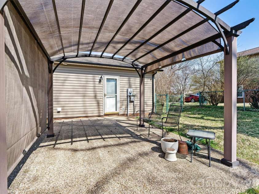 215 Towne Court, Conover, NC 28613.  MLS# CAR4354978, YatesRealty ID 4514. Back Patio/Rear Entry View 