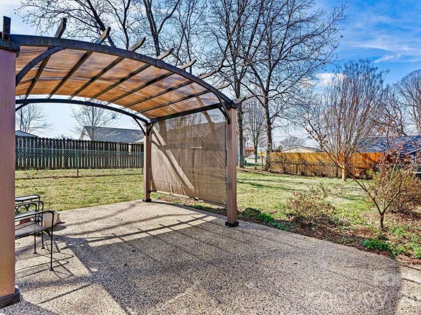 215 Towne Court, Conover, NC 28613.  MLS# CAR4354978, YatesRealty ID 4514. Back Patio/Yard View 