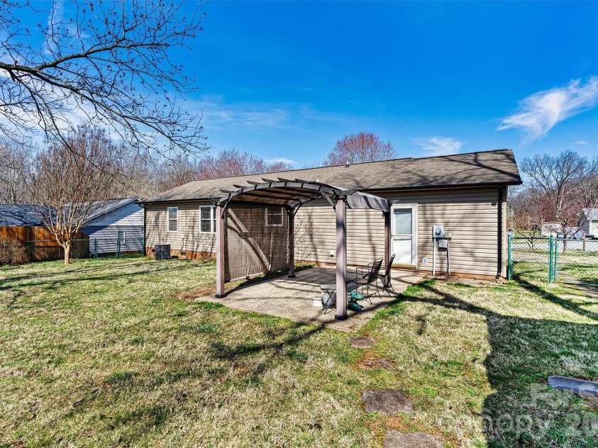 215 Towne Court, Conover, NC 28613.  MLS# CAR4354978, YatesRealty ID 4514. Back Yard Focused View 
