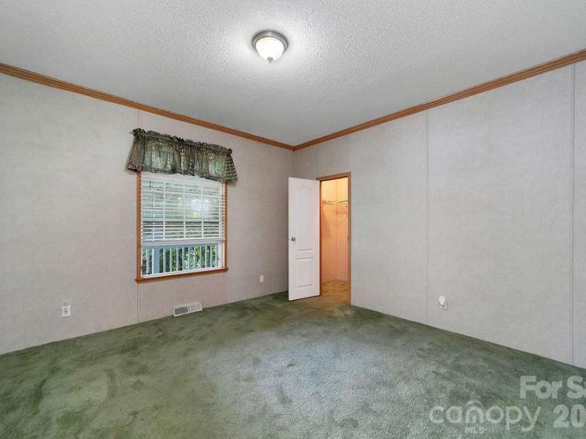 98 New Sorrells Estate, Brevard, NC 28712.  MLS# CAR4414087, YatesRealty ID 45142. Bedroom