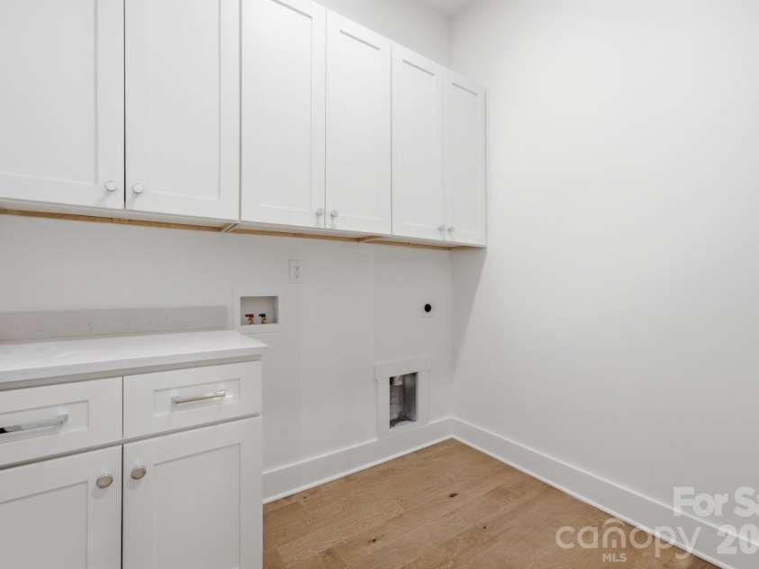 612 Camelot Drive, Salisbury, NC 28144.  MLS# CAR4411574, YatesRealty ID 45149. Downstairs Laundry Room