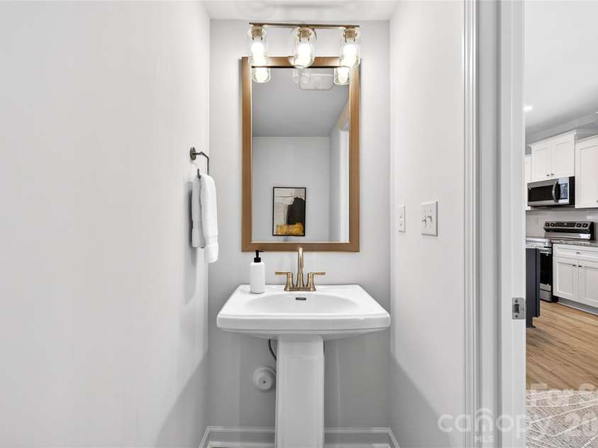 2719 Willow Street, Charlotte, NC 28208.  MLS# CAR4321013, YatesRealty ID 4515. Half Bathroom Downstairs