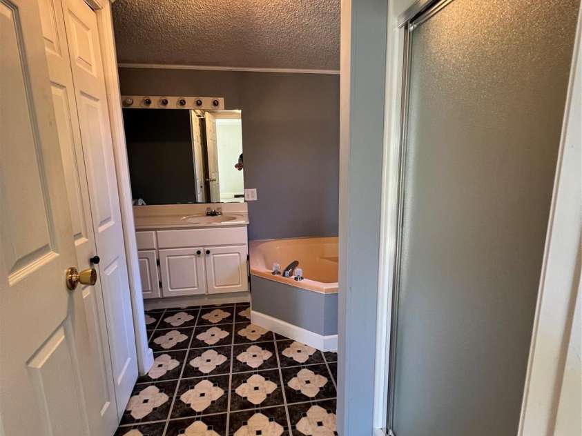 443 Smith Street, Albemarle, NC 28001.  MLS# CAR4415465, YatesRealty ID 45153. Primary Bathroom