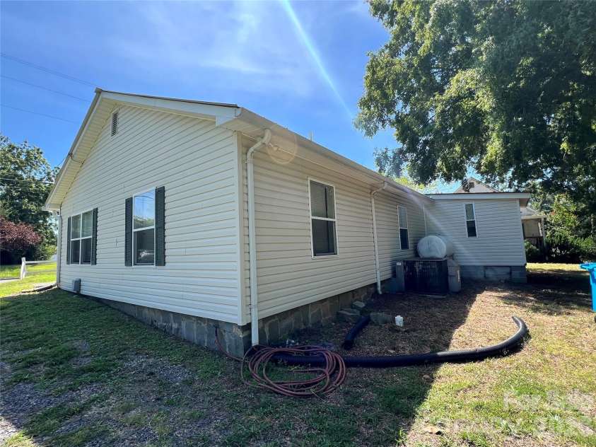 443 Smith Street, Albemarle, NC 28001.  MLS# CAR4415465, YatesRealty ID 45153. Right Side and Rear View