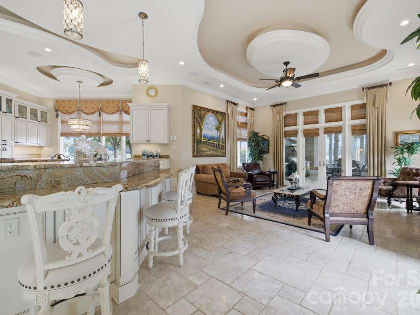 178 Mariner Pointe Lane, Mooresville, NC 28117.  MLS# CAR4414356, YatesRealty ID 45154. Well-appointed kitchen features extensive cabinetry, multiple work areas and an open, functional layout.