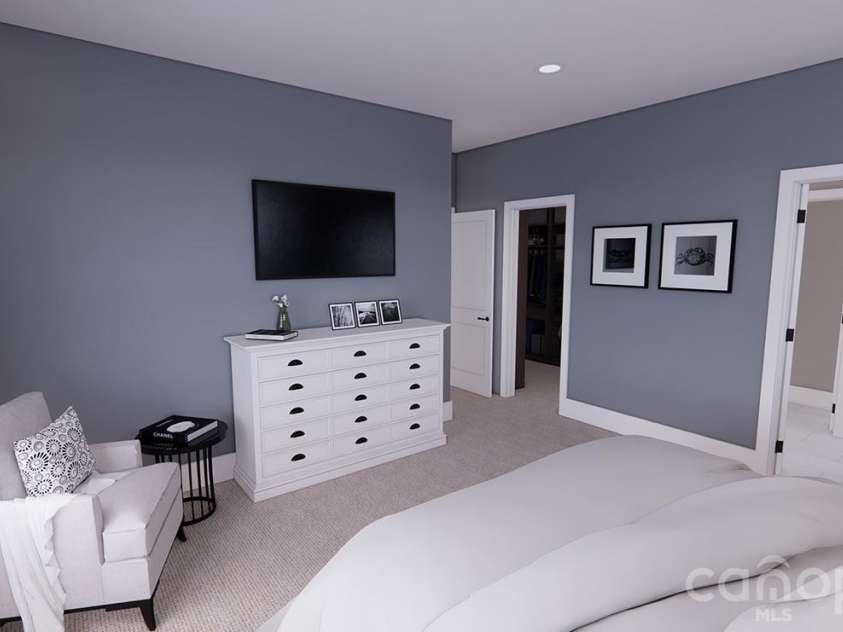 166 Williams Meadow Loop, Hendersonville, NC 28739.  MLS# CAR4406204, YatesRealty ID 45159. Main-Level Primary Suite-Rendering courtesy of Royal Oaks Design.