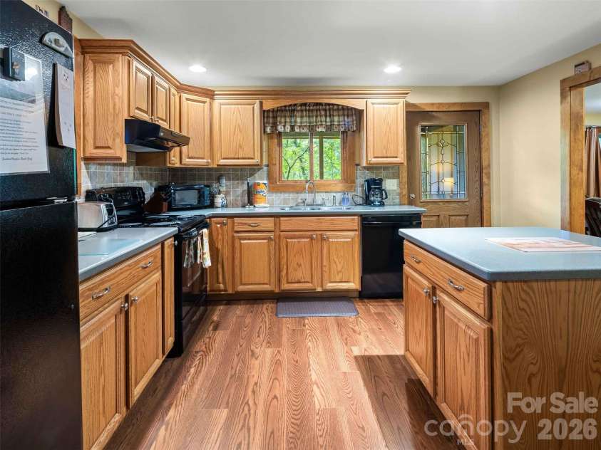 25 Anne Street, Lake Junaluska, NC 28745.  MLS# CAR4400254, YatesRealty ID 45164. Lower Level Kitchen
