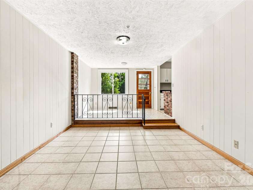 708 Loop Road, Hendersonville, NC 28792.  MLS# CAR4415625, YatesRealty ID 45204. 