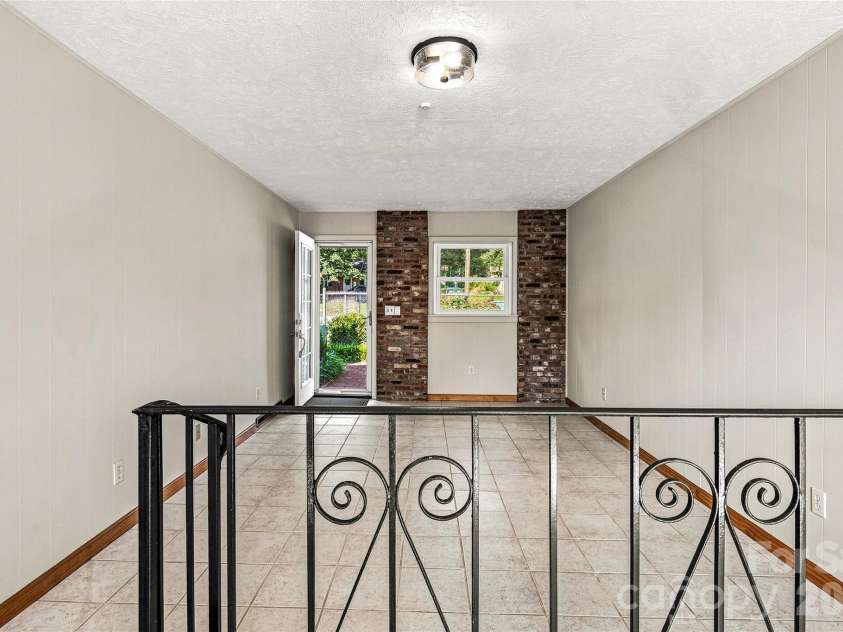 708 Loop Road, Hendersonville, NC 28792.  MLS# CAR4415625, YatesRealty ID 45204. 