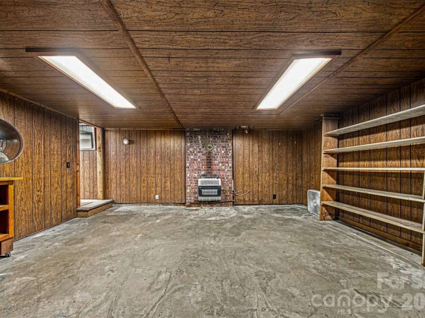 708 Loop Road, Hendersonville, NC 28792.  MLS# CAR4415625, YatesRealty ID 45204. Unfinished basement