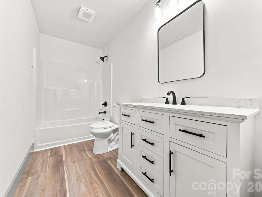 2945 Link Drive, Granite Falls, NC 28630.  MLS# CAR4409681, YatesRealty ID 45206. 2nd Bathroom- Vanity Color May Vary- Stock Photo