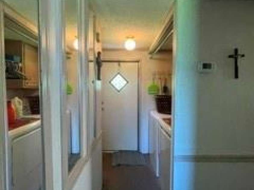 1098 Macedonia Road, Gaffney, SC 29341.  MLS# CAR4415994, YatesRealty ID 45218. Hall at back door and laundry