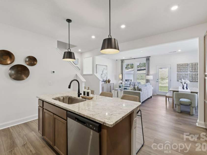 7607 Ethora Way, Charlotte, NC 28216.  MLS# CAR4416061, YatesRealty ID 45219. Kitchen Island Open Concept Layout-Representation picture-not actual home