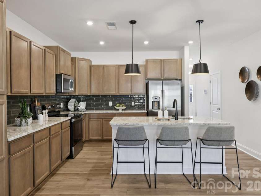 7607 Ethora Way, Charlotte, NC 28216.  MLS# CAR4416061, YatesRealty ID 45219. Kitchen-Representation picture-not actual home