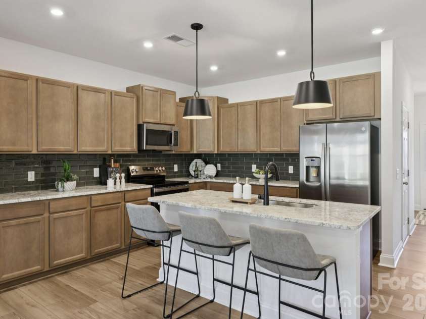 7607 Ethora Way, Charlotte, NC 28216.  MLS# CAR4416061, YatesRealty ID 45219. Kitchen-Representation picture-not actual home