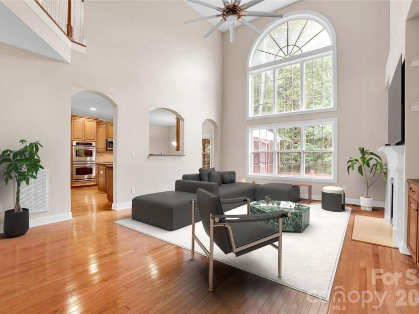 5003 Trinity Trace Lane, Monroe, NC 28110.  MLS# CAR4412558, YatesRealty ID 45223. Living room *Virtual Staging*