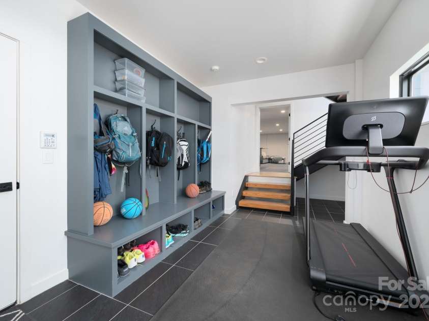 22 Innsbrook Road, Asheville, NC 28804.  MLS# CAR4215149, YatesRealty ID 4523. Mudroom/Gym Area with separate entrance off the three car garage