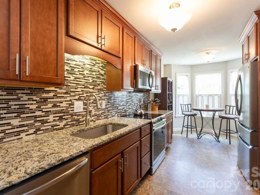 120 Arbor Ridge Road, Mount Holly, NC 28120.  MLS# CAR4414980, YatesRealty ID 45244. Kitchen and breakfast area