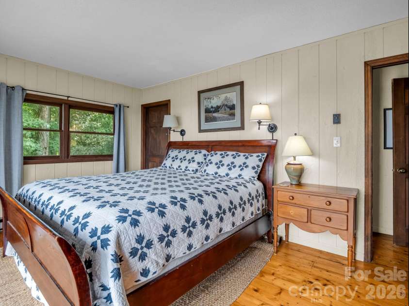 179 Sarvis Lane, Mars Hill, NC 28754.  MLS# CAR4415228, YatesRealty ID 45246. Second ensuite bedroom on main level/top floor