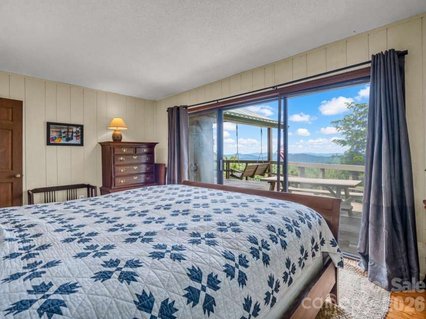 179 Sarvis Lane, Mars Hill, NC 28754.  MLS# CAR4415228, YatesRealty ID 45246. Second ensuite bedroom on main level/top floor