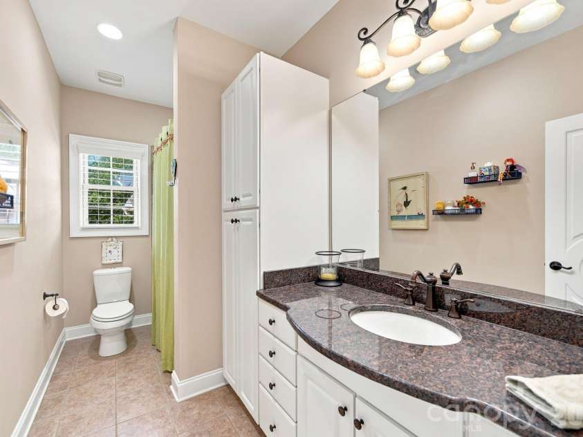 1001 Heritage Acres Drive, Weddington, NC 28104.  MLS# CAR4414833, YatesRealty ID 45250. Main Level full bath