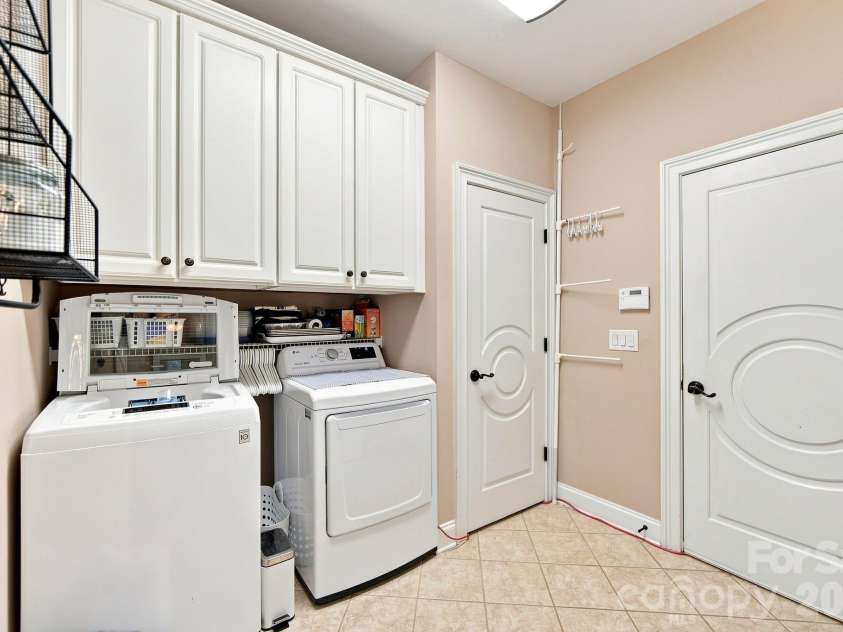 1001 Heritage Acres Drive, Weddington, NC 28104.  MLS# CAR4414833, YatesRealty ID 45250. Main Level laundry room