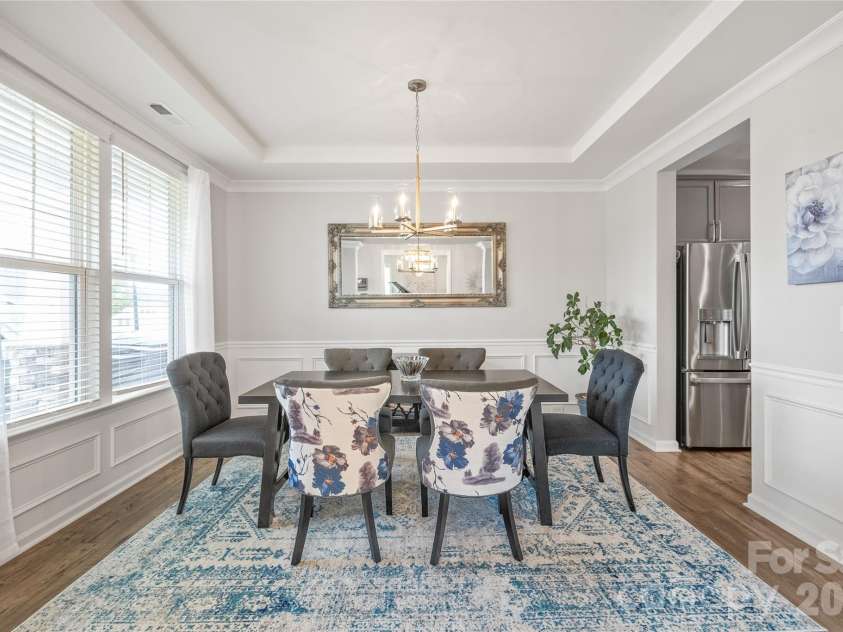 6440 Ancient Way, Fort Mill, SC 29707.  MLS# CAR4413430, YatesRealty ID 45254. Effortlessly flowing from the dining room, the chef’s kitchen offers a seamless layout built for intuitive serving and easy entertaining.
