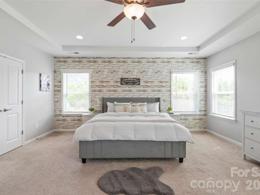 6440 Ancient Way, Fort Mill, SC 29707.  MLS# CAR4413430, YatesRealty ID 45254. Elegant double doors open directly into the primary ensuite, creating a dramatic, spa-like entrance.
